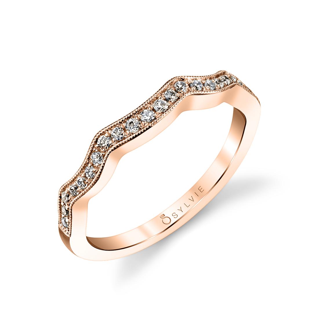 curved wedding band in rose gold