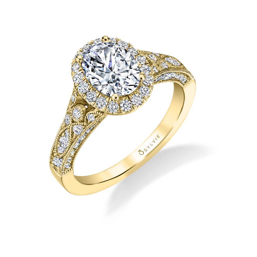 oval yellow gold engagement ring
