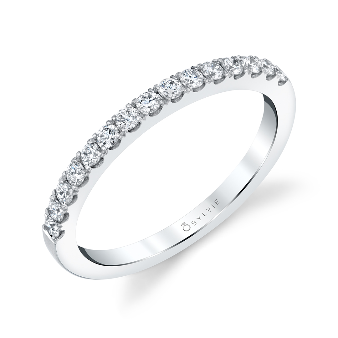 profile image of a three stone halo engagement ring