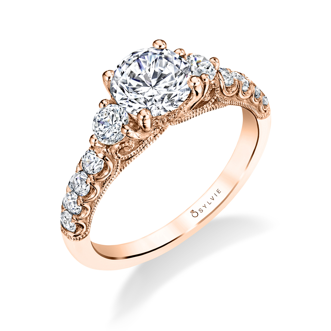 Three stone engagement ring with round diamonds in rose gold - Lara