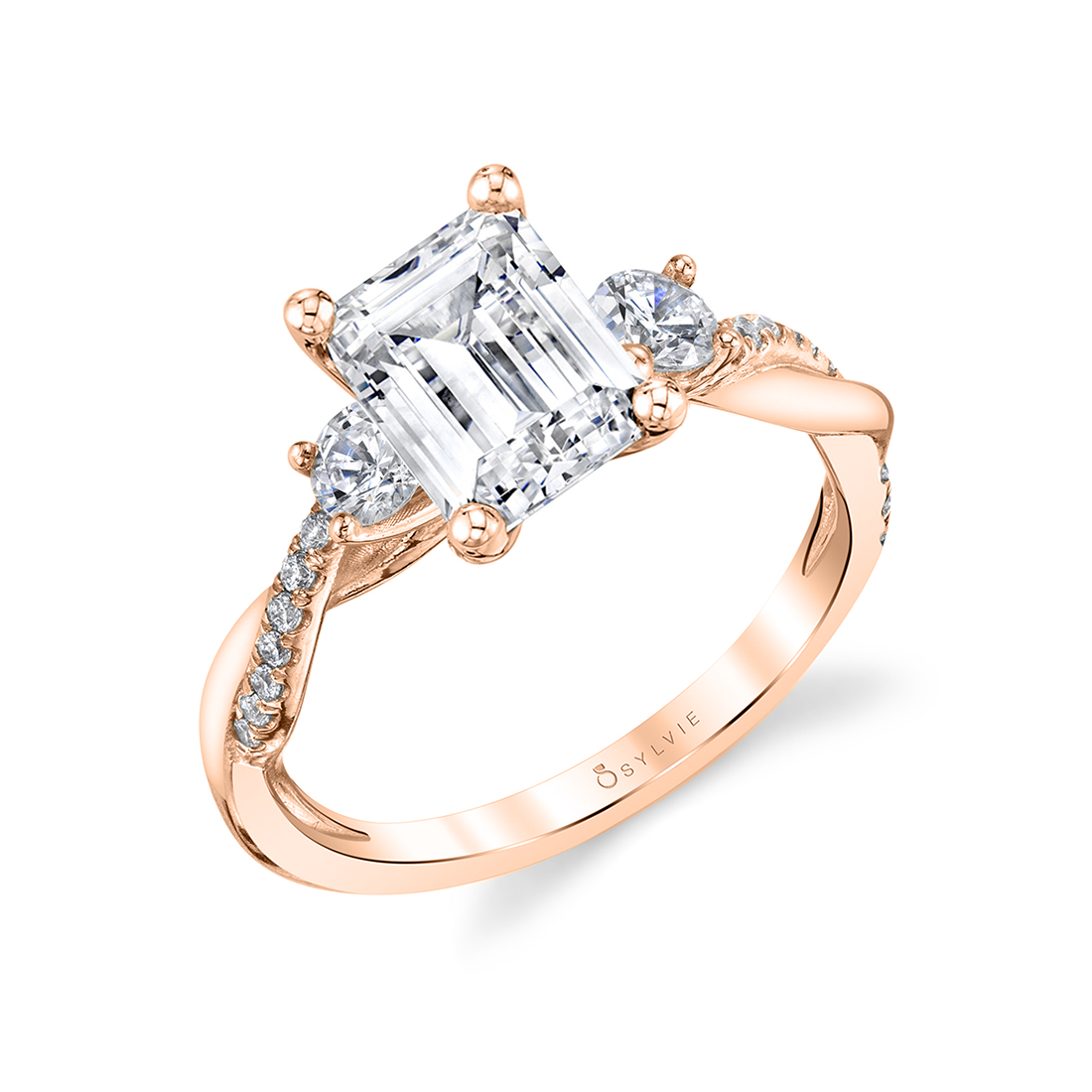 3 stone emerald cut engagement ring`