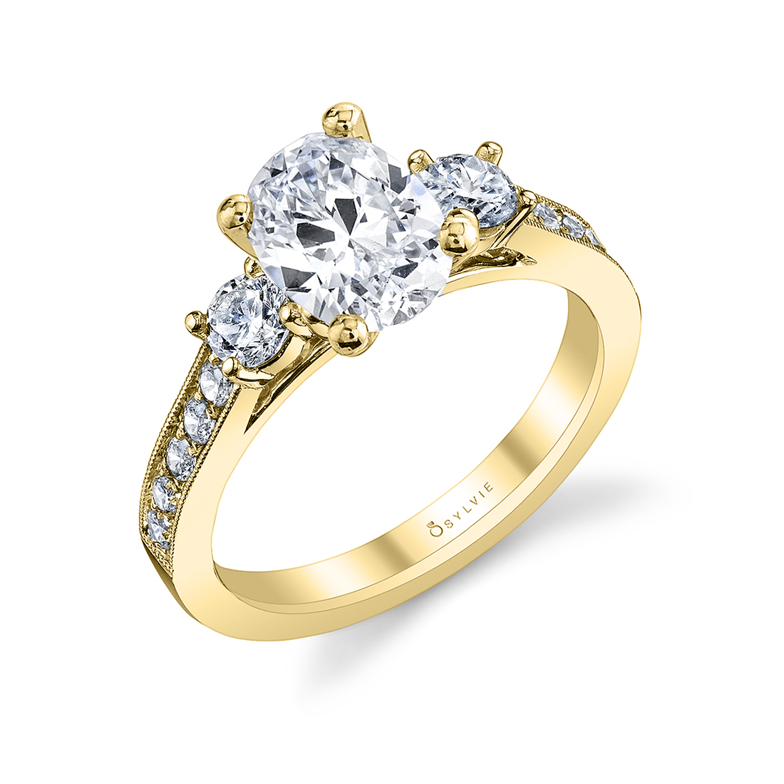 3 stone oval engagement ring in yellow gold
