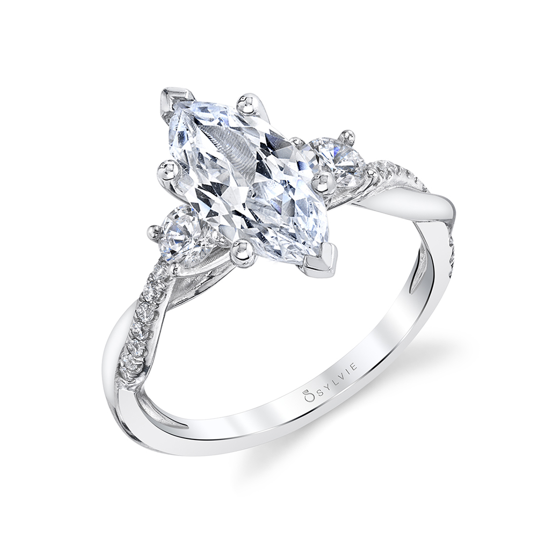 marquise shaped 3 stone engagement ring in white gold