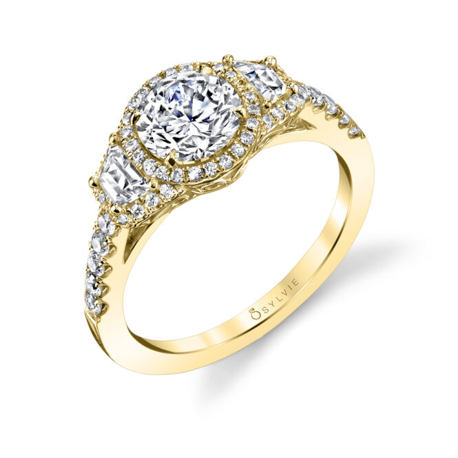 three stone halo engagement ring in yellow gold