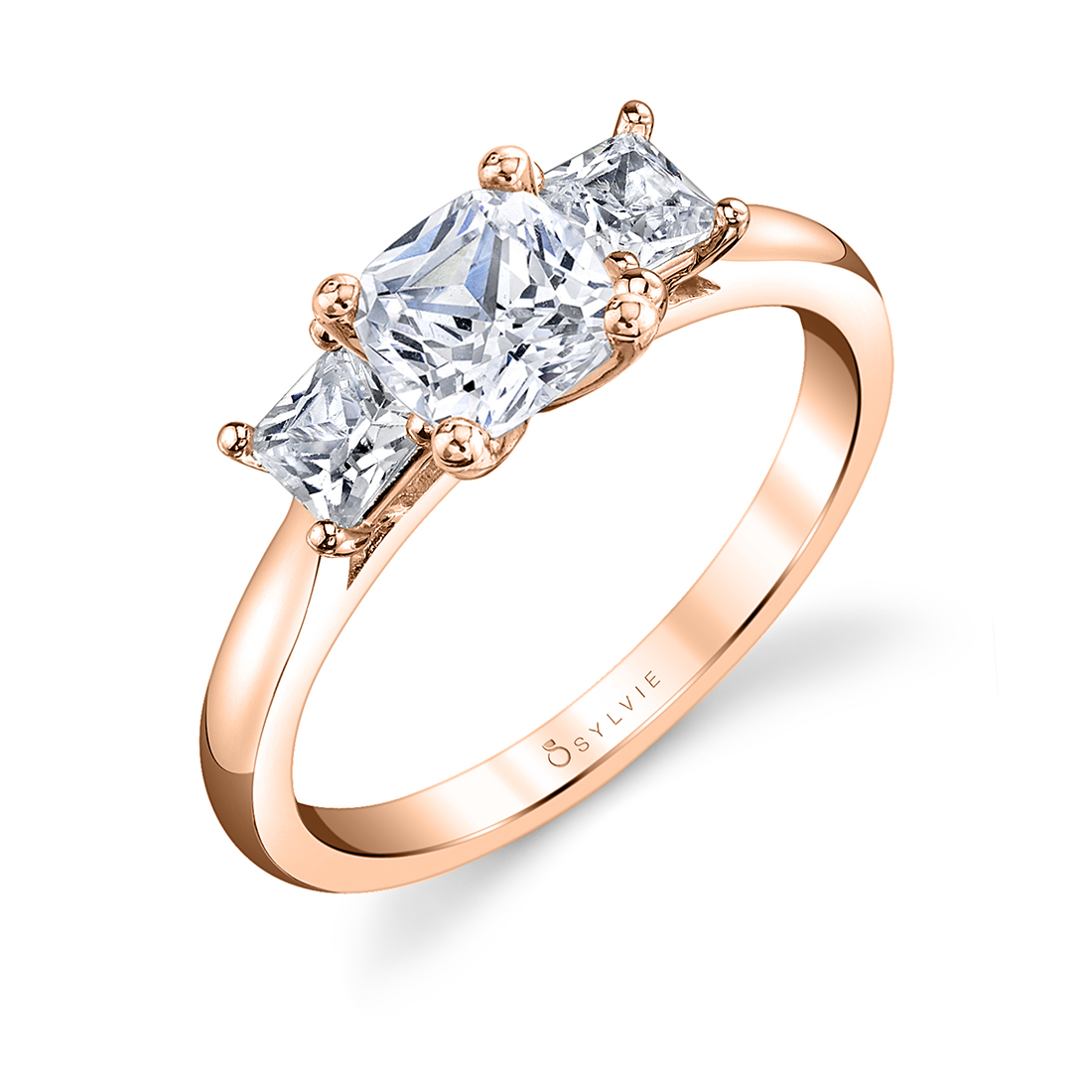 3 stone cushion cut engagement ring in rose gold