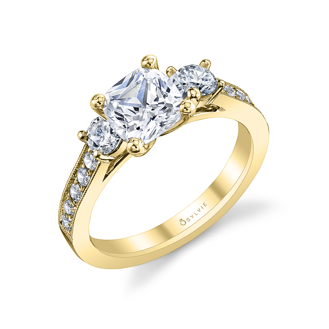 cushion cut 3 stone engagement ring in yellow gold