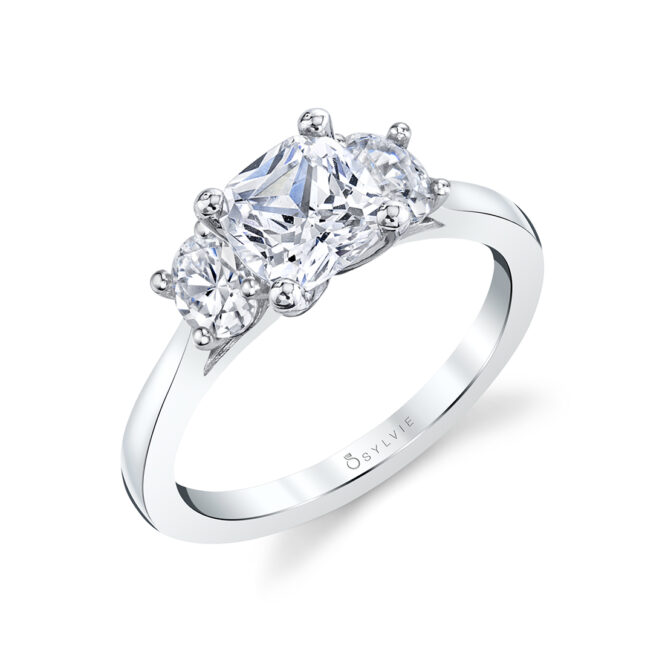 cushion cut 3 stone engagement ring in white gold