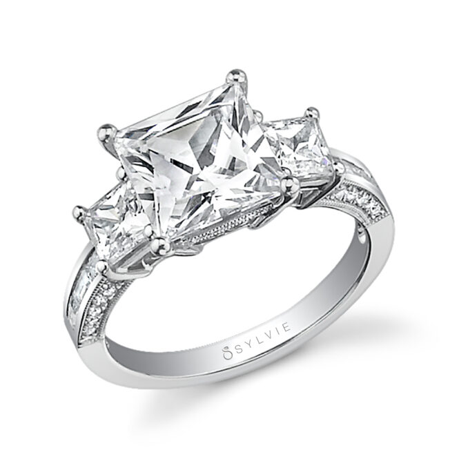 princess cut engagement ring with princess side stones in white gold