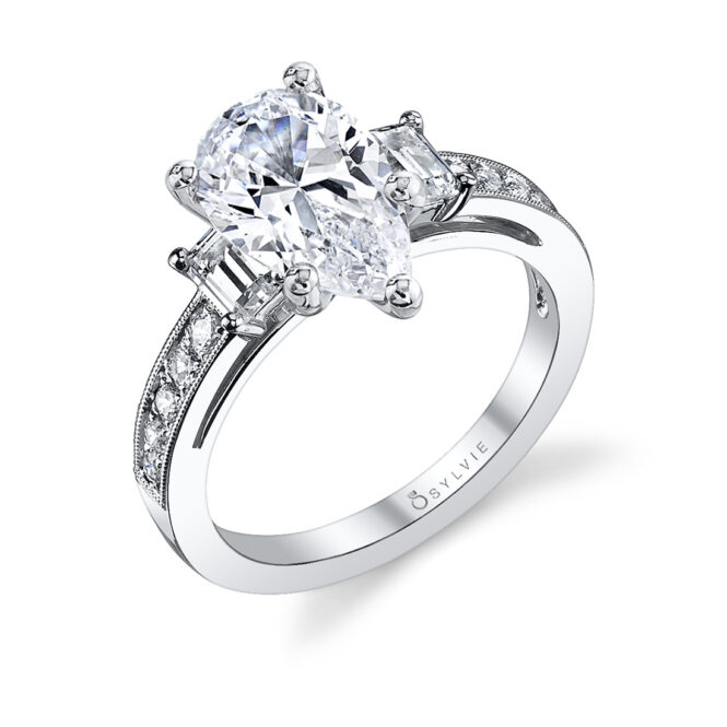 three stone pear shaped engagement ring in white gold