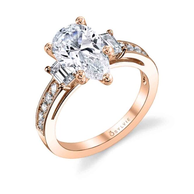 three stone pear shaped engagement ring in rose gold