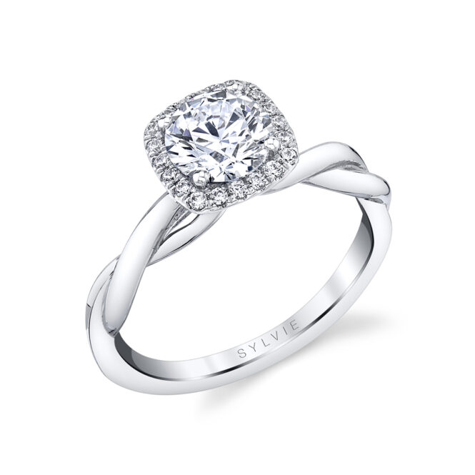 profile image of a halo engagement ring with spiral band