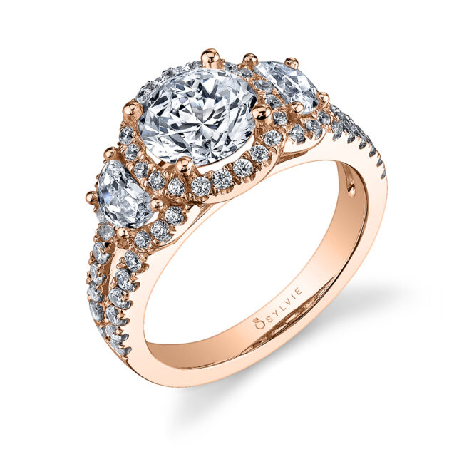 three stone engagement ring with half moon side stones in rose gold