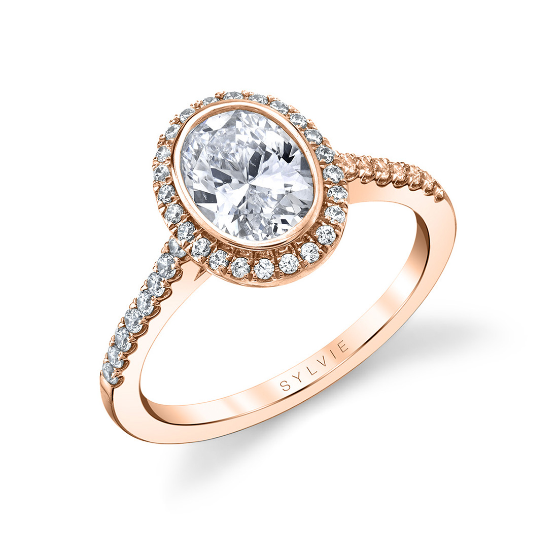 bezel set oval engagement ring in rose gold