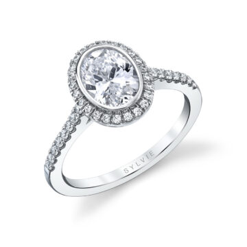 bezel set oval engagement ring in white gold
