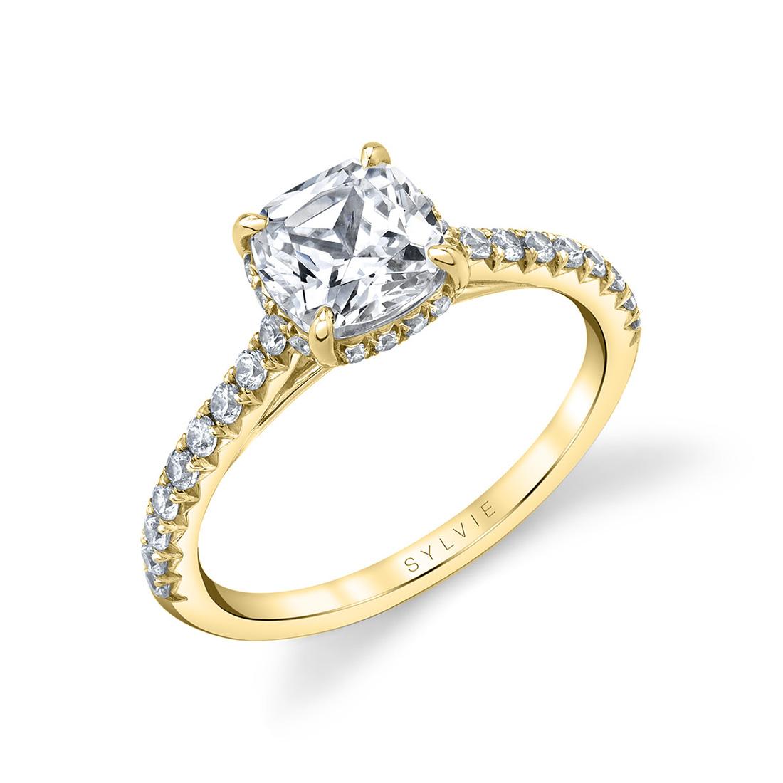 cushion cut hidden halo engagement ring in yellow gold