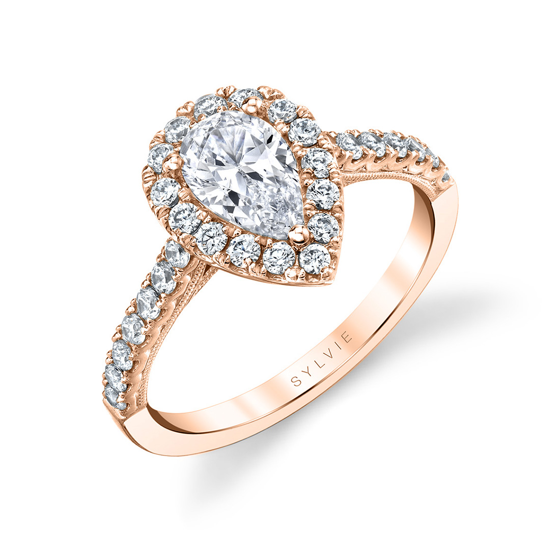 pear shaped halo engagement ring in rose gold