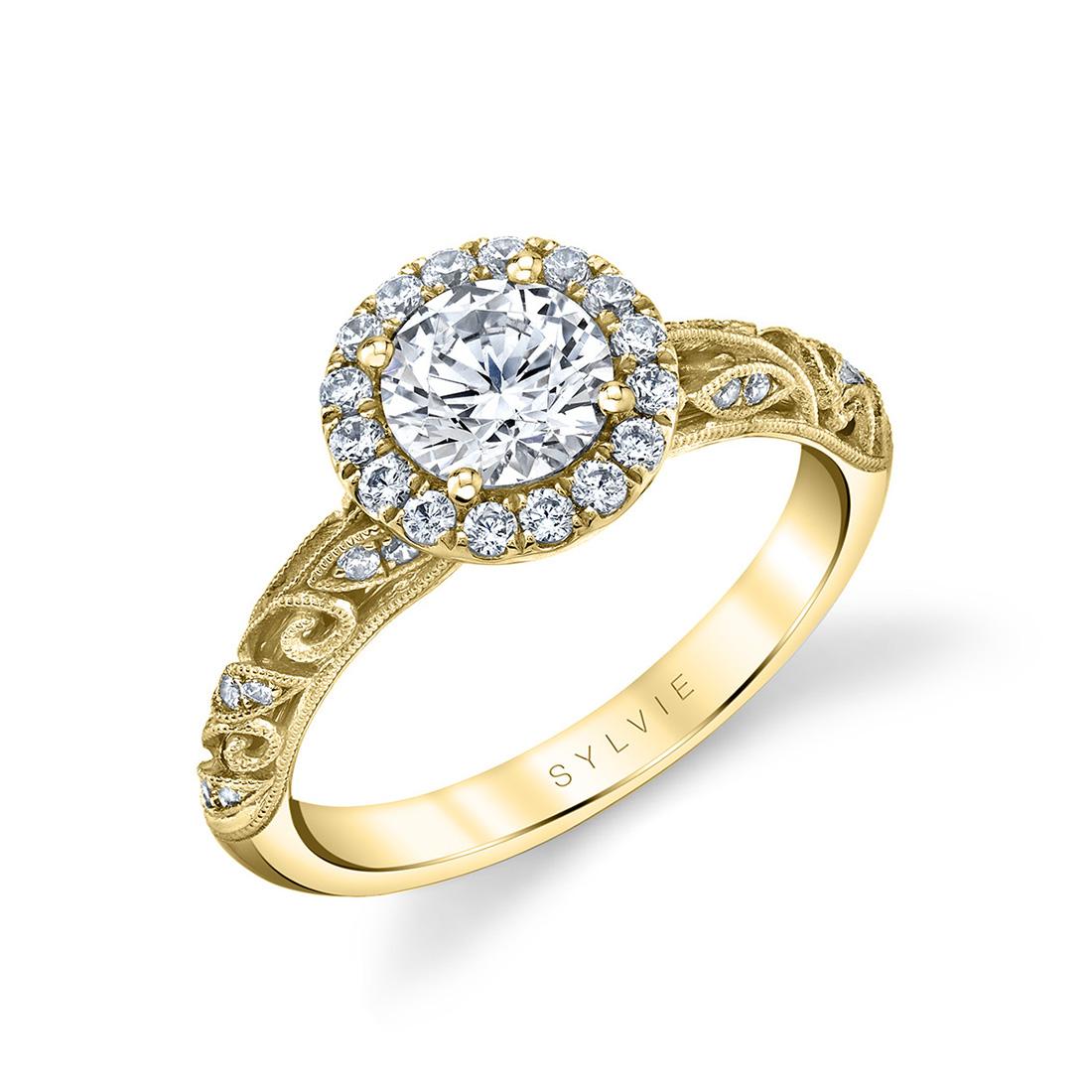 vintage halo engagement ring in yellow gold
