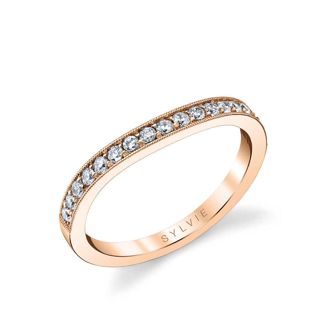 channel set wedding band with milgrain detail in rose gold