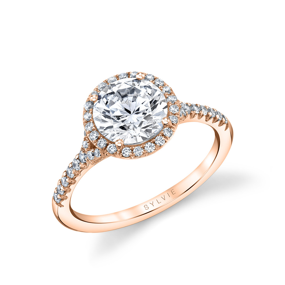modern halo engagement ring with split shank in rose gold