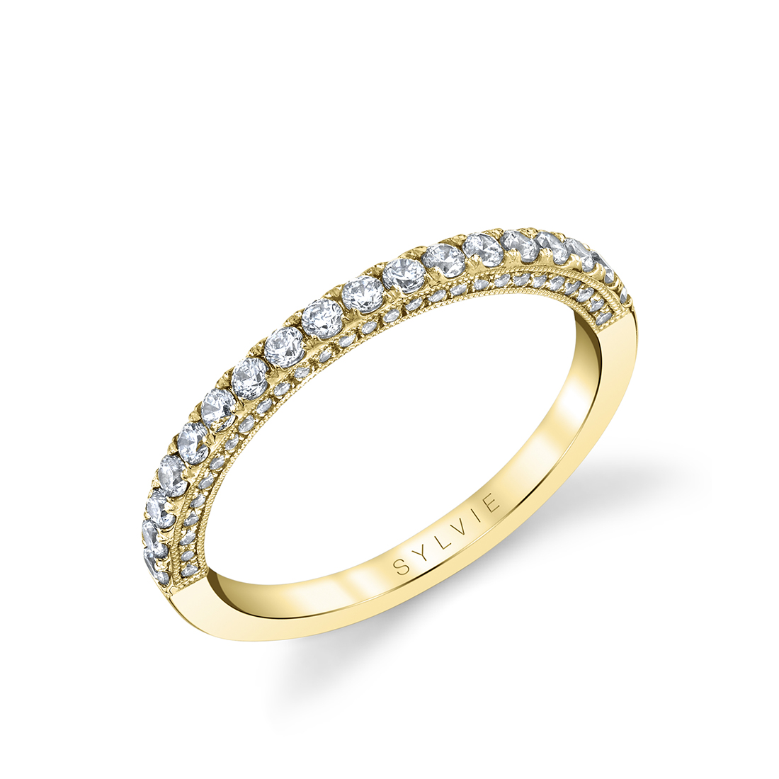 pave diamond wedding band in yellow gold