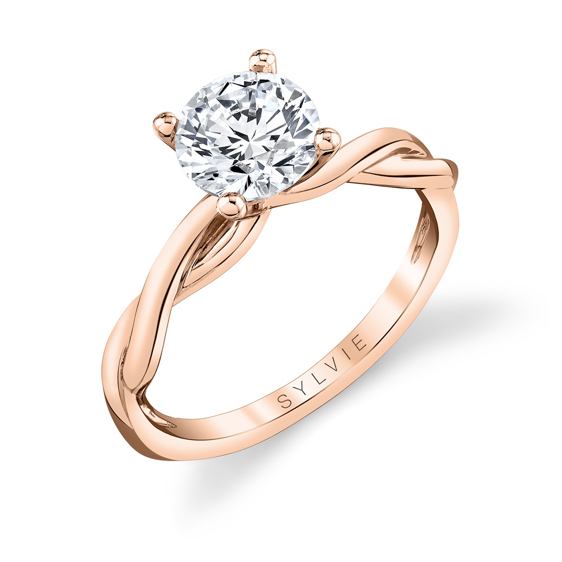 twist engagement ring in rose gold