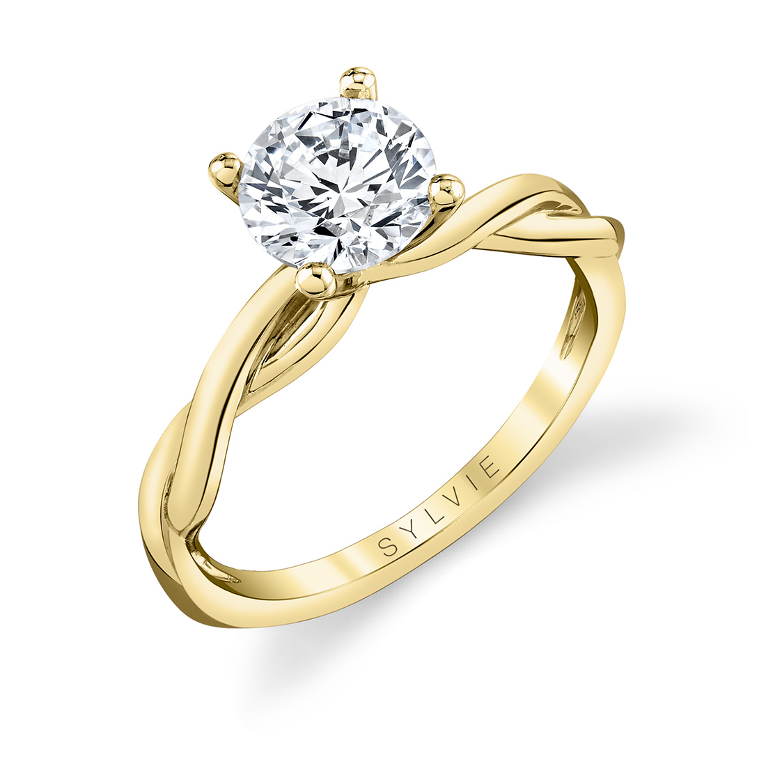 twist engagement ring in yellow gold